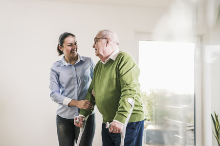 woman taking care of an older man